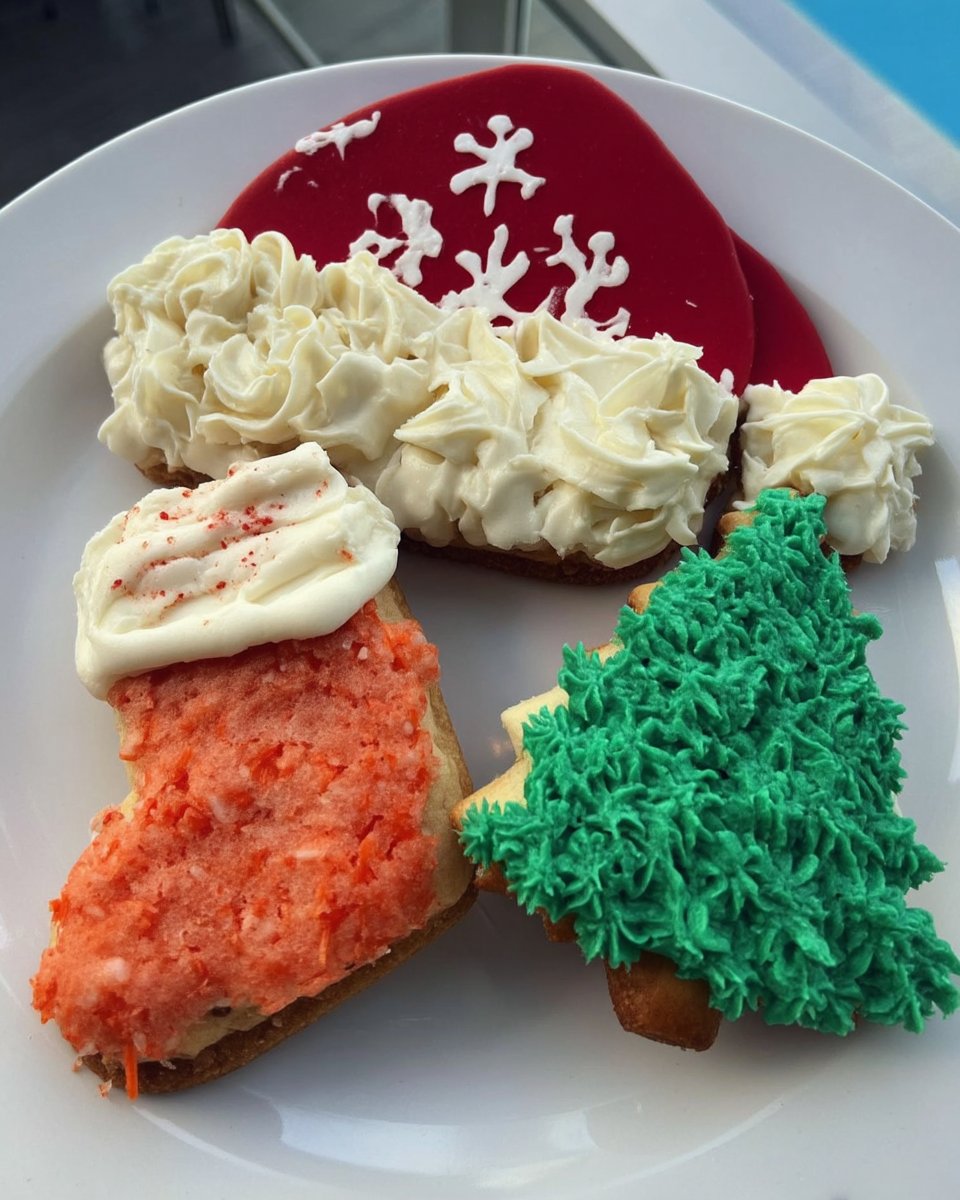 Soft sugar cookies decorated with simple icing on a vintage plate