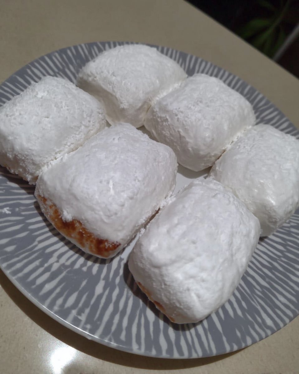 Kourabiedes served on a holiday platter with coffee