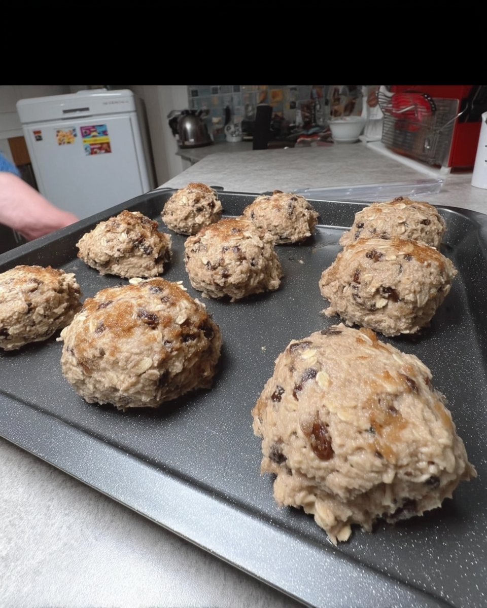Ingredients for oatmeal raisin cookies including oats raisins and molasses