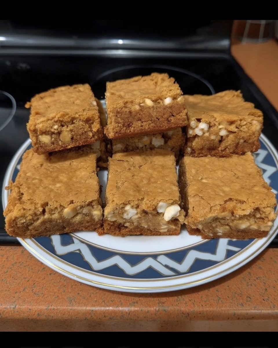 White chocolate macadamia cookies served with a glass of milk