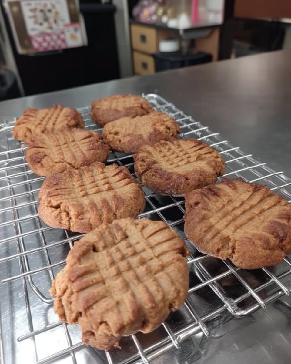 Flourless peanut butter cookies served with a glass of milk