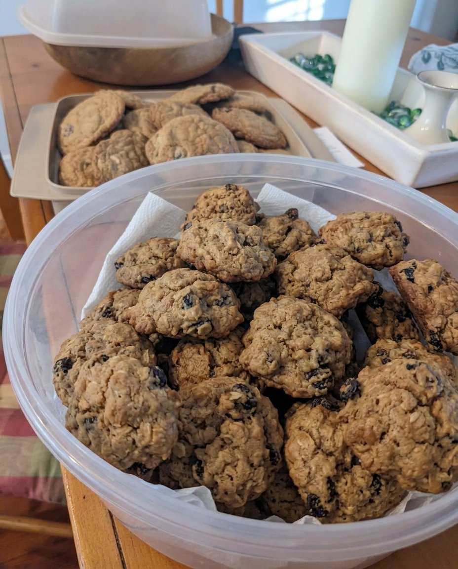 Soft and spiced rum raisin cookies on a wire cooling rack