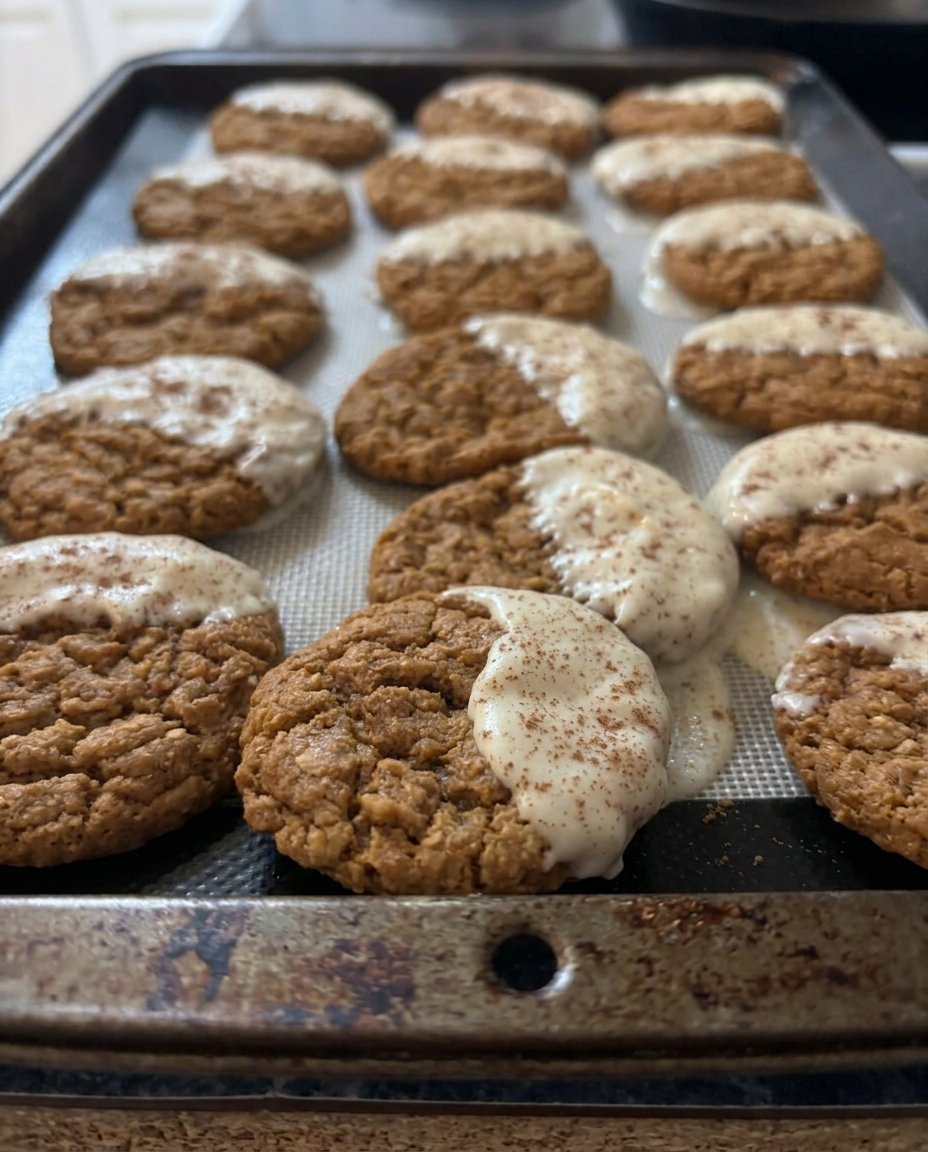 A stack of soft chewy paleo gingerbread cookies in a vintage jar